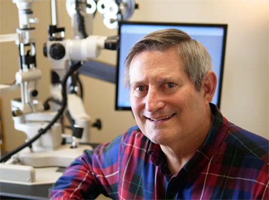 Picture of Doctor James Harper Optometrist in his office.